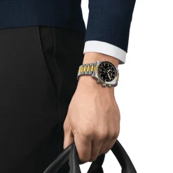 TISSOT PR516 CHRONOGRAPH GULD PVD MED SORT URSKIVE
